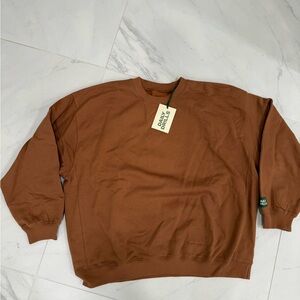 Daily Drills woman’s oversized fleece crew in Mousse.  Brand new just received